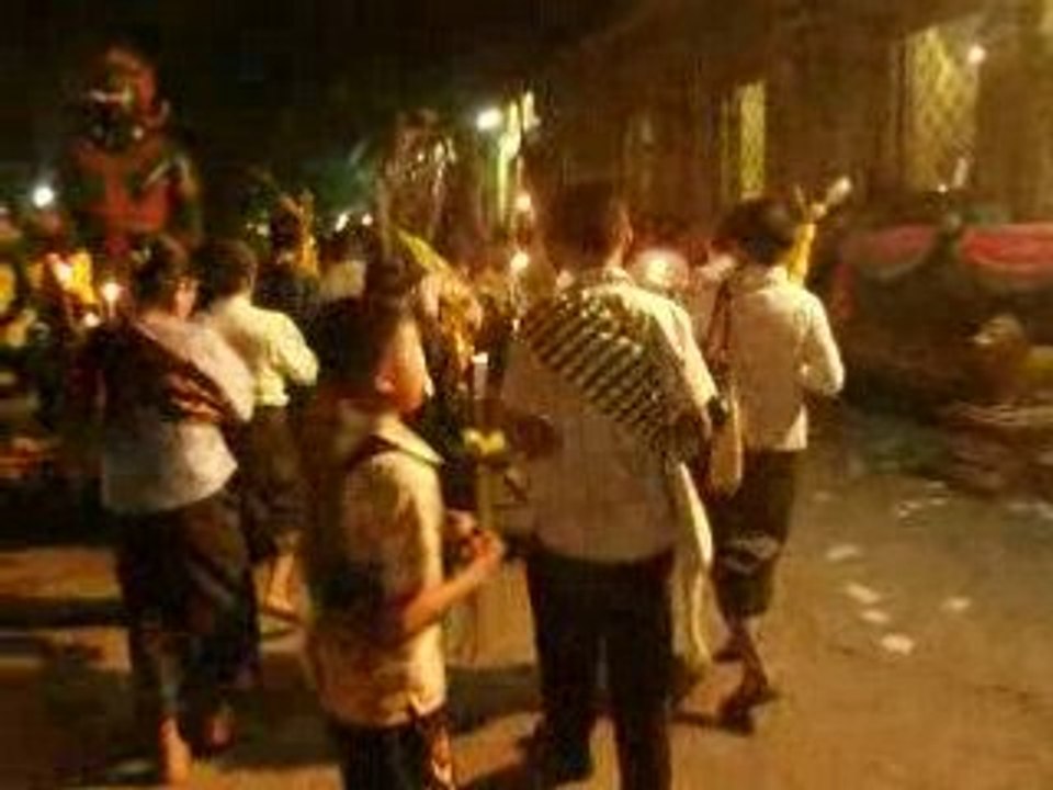 en procession