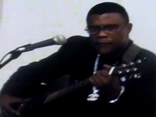 Mtre.ANGE KUMBI  , artiste peintre et griot musical