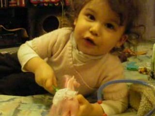 Lou chante petit papa noel