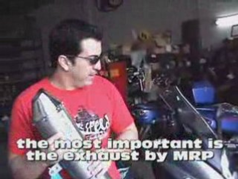 SYM TV 250cc Exhaust by the Scooter Maven