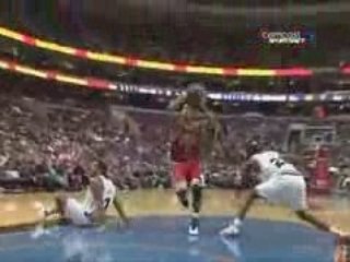 Derrick Rose Crosses Over Andre Miller (11.30.08)