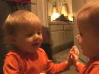 Redhead Mom and Her Baby Laughing and Playing