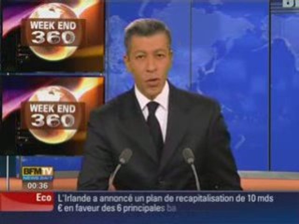 un irakien lance ses 2 chaussures en plein face de bush