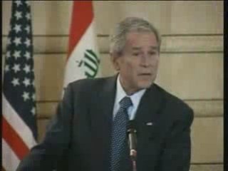 iraqi Man Throws Shoes at Bush