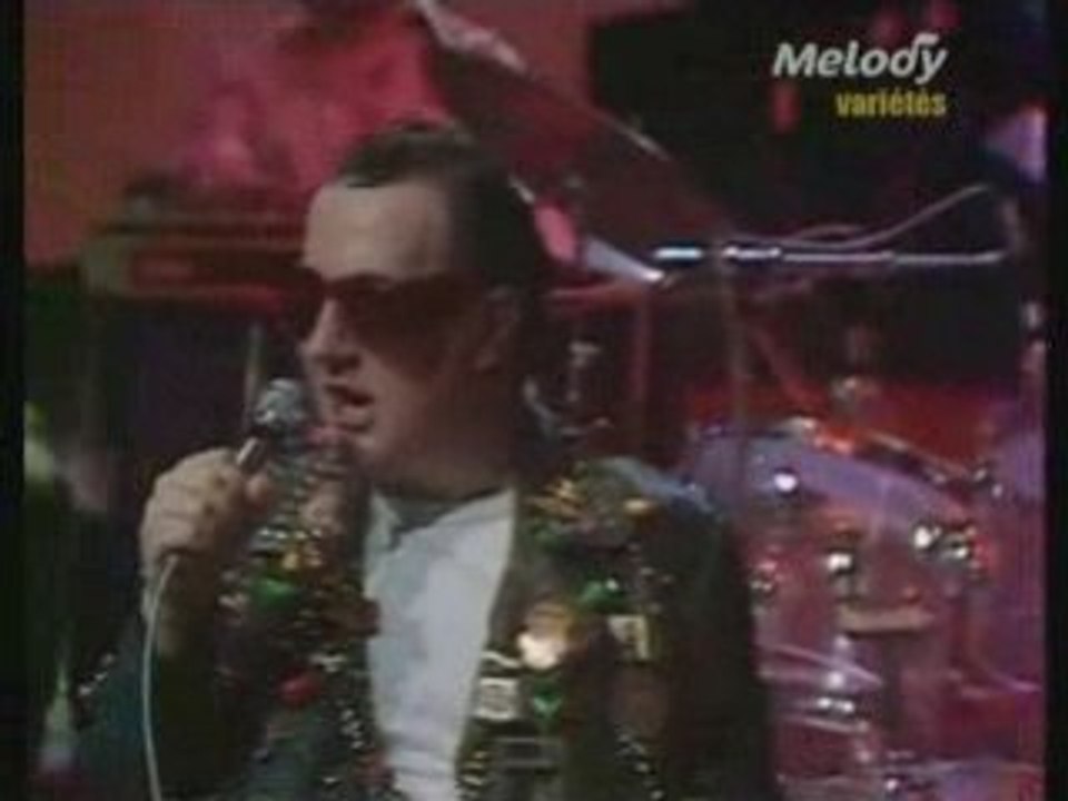 Eddy Mitchell & Coluche - C'est un rocker