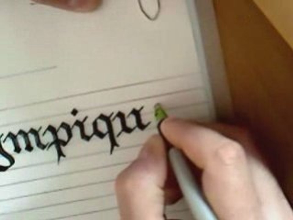 "Olympique de Marseille" 1/2 : Calligraphie gothique.