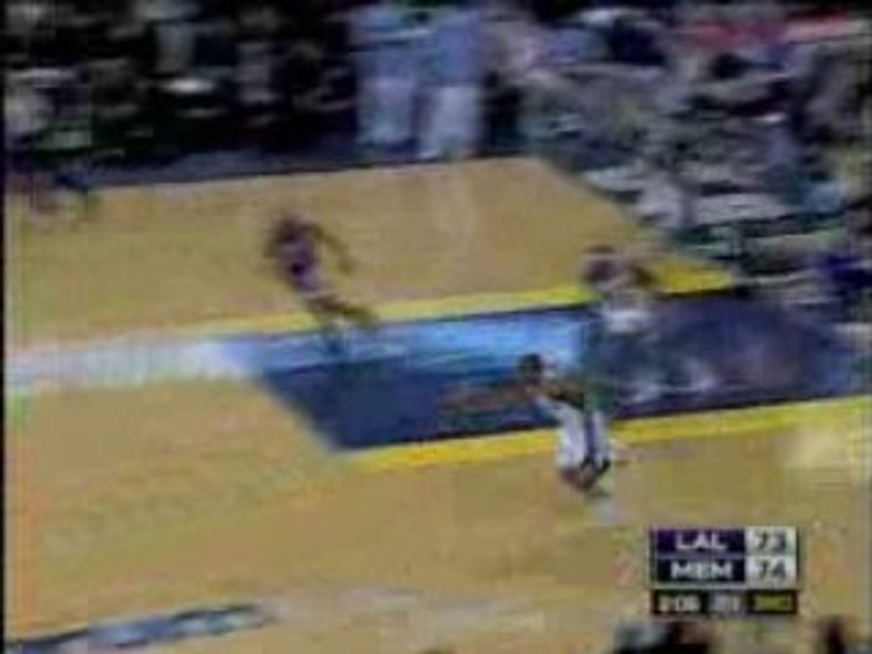 O.J. Mayo blocks Luke Walton's shot off the backboard.