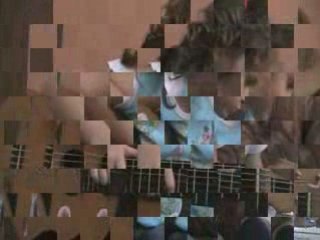 Tatiana toca guitarra