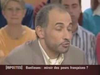 Les Tiques nerveux d'Alain finkelkraut face à Tariq Ramadan
