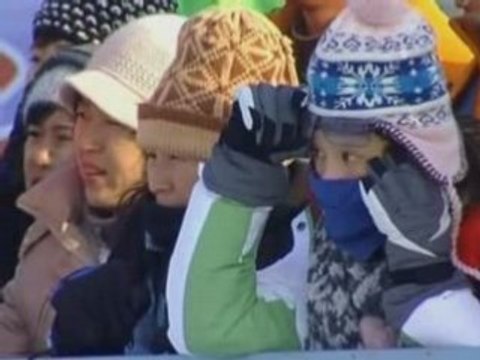 Ice swimmers in China take the plunge in freezing cold water