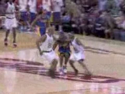 NBA LeBron James gets in between two Boston