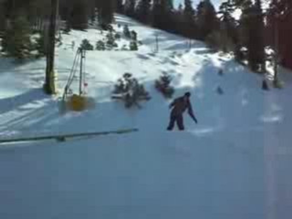 Snowboarder Smashes Face on Rail