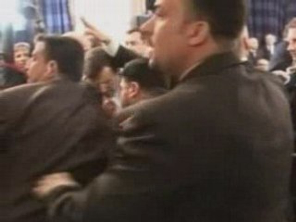 Bush shoe thrower seeks Swiss exile