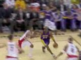 NBA Kobe Bryant sinks an amazing lay-up against the Raptors.