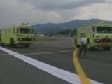 Small aeroplane tips over on runway