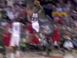 NBA Grant Hill finishes with a huge slam over Joakim Noah.