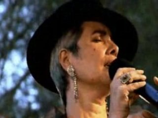 Monica chant "Vuelvo al Sur" avec Arrabalera Tango