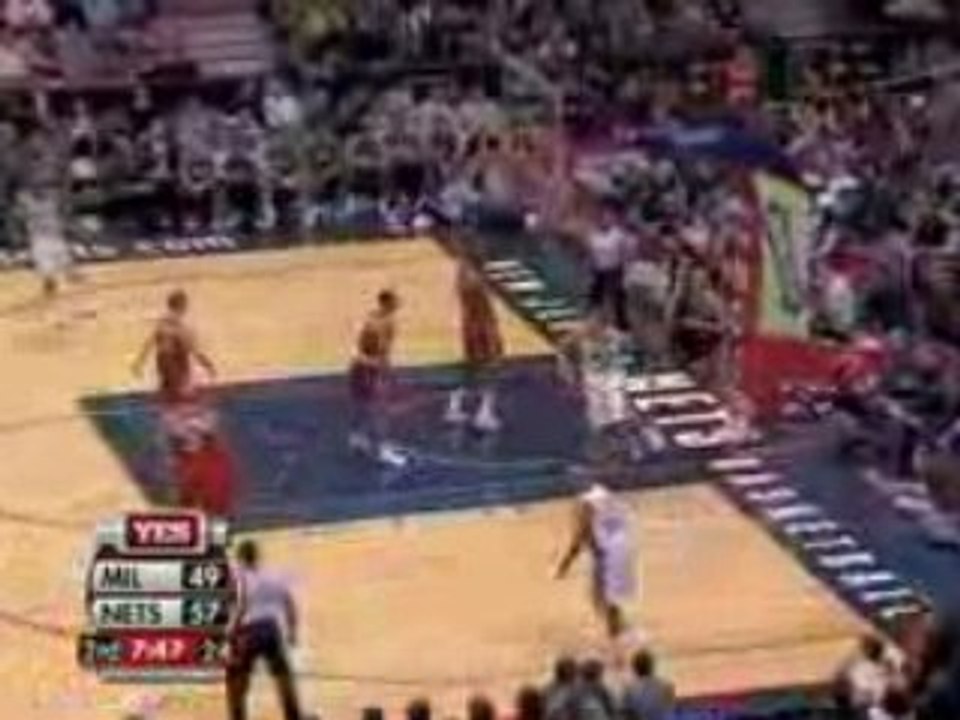 NBA Devin Harris throws a nice pass to Brook Lopez.