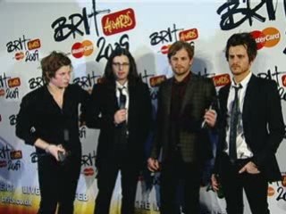 Kings of Leon celebrate their Brit Awards