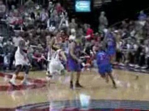 NBA Greg Oden blocks Chris Duhon's shot into the stands.