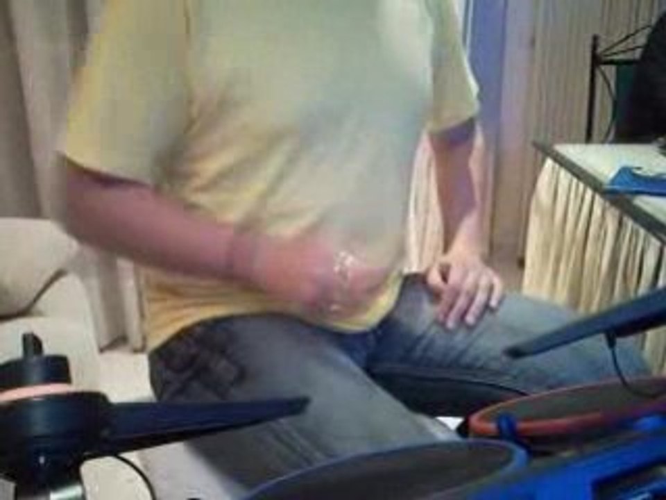 Santeria Guitar Hero World Tour con una mano.