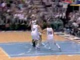 NBA Rajon Rondo leaves his feet, goes around the defenders,