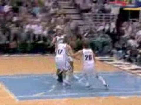 NBA Rajon Rondo leaves his feet, goes around the defenders,
