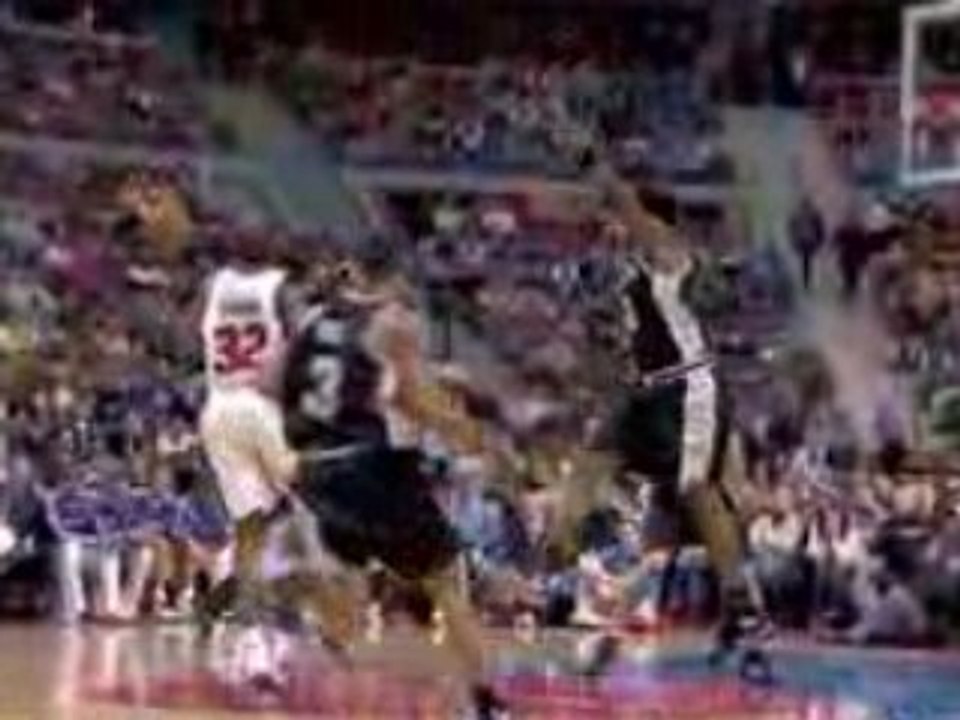 NBA Jason Maxiell drives the lane and throws a dunk down wit