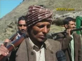 Indian Villagers Defend With Guns