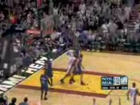 NBA Dwyane Wade flys in for the two-handed dunk.