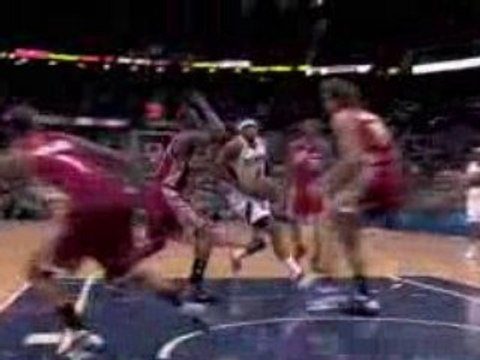 NBA Josh Smith drives the lane for this monster slam.