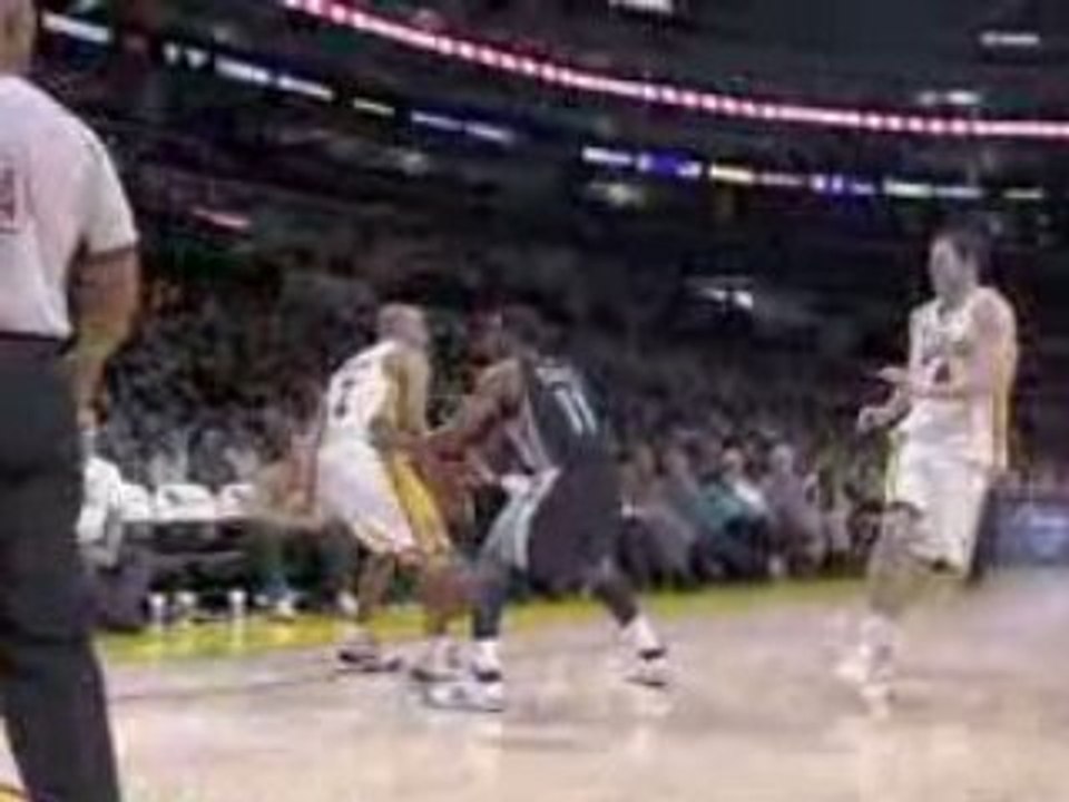 NBA Derek Fisher demonstrates the behind the back method on