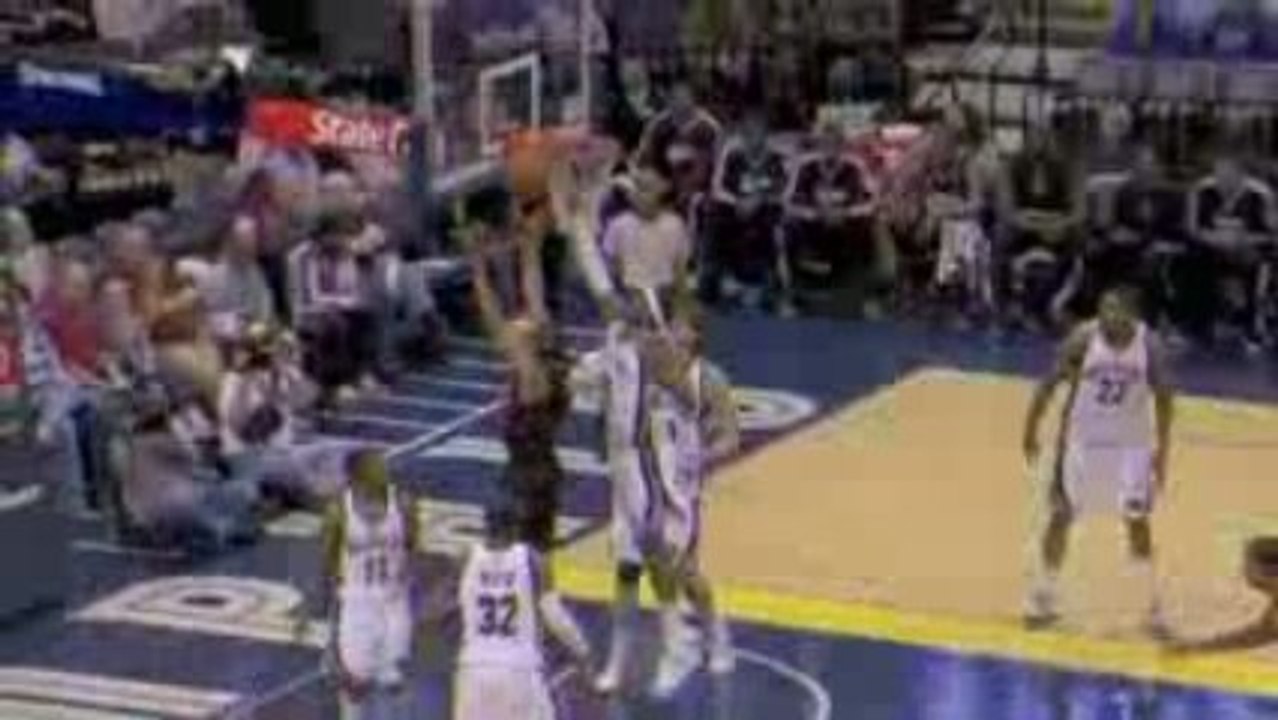 NBA Hakim Warrick swats Andre Miller's shot away and O.J. Ma