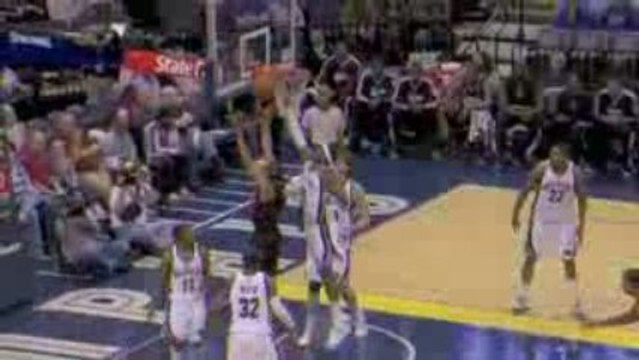 NBA Hakim Warrick swats Andre Miller's shot away and O.J. Ma