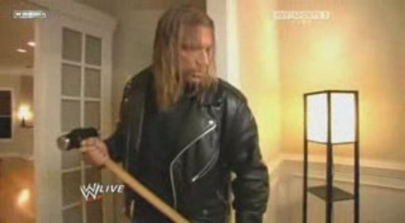 Triple H attacked Randy Orton inside his house