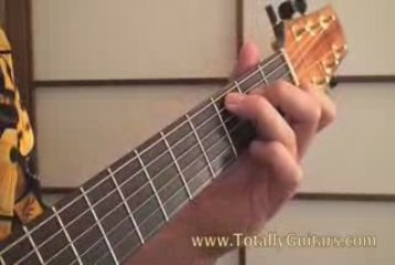 Quick Tip-Changing Chords On An Acoustic Guitar