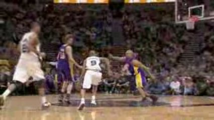 NBA Tony Parker creates room in the lane and hands it off to