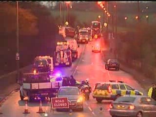 One dead in lorry and buses crash