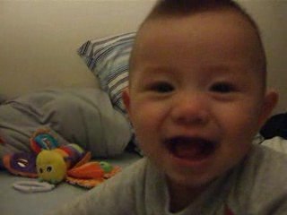 Elio turns over onto his stomach for the 1st time!