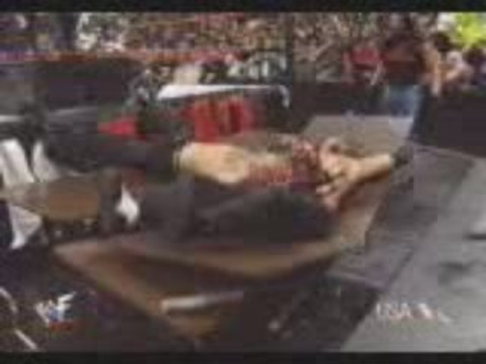 Tronch-Dudley Boys put Hardy Boyz through tables.