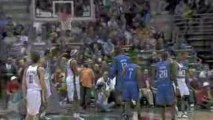 NBA Dwight Howard sends Charlie Bell's shot into the stands.