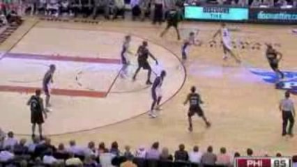 NBA Andre Miller splits the defense for a lay-up with a nice