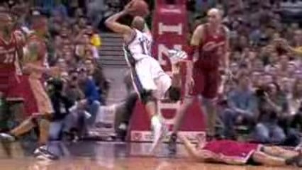 NBA Vince Carter maintains his concentration to get this cir