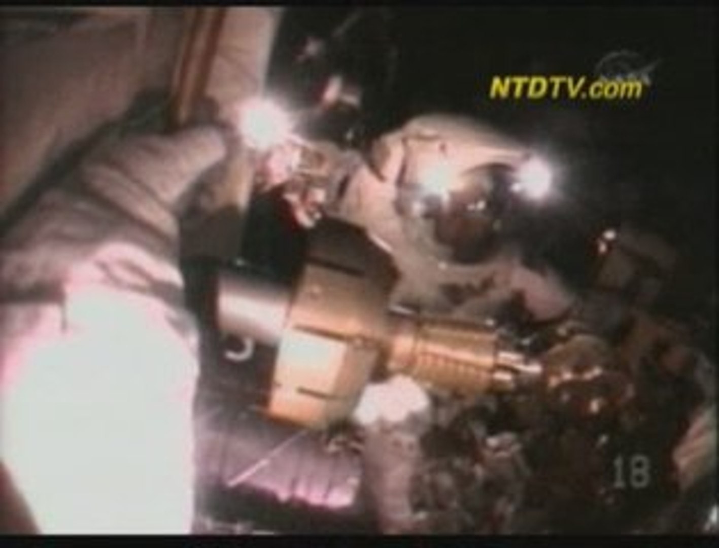 Discovery Spacewalk Continues