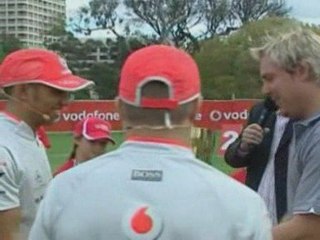 F1 champion Lewis Hamilton plays cricket with Shane Warne