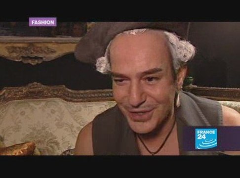 Paris fashion week: Galliano tells why his brides wear black