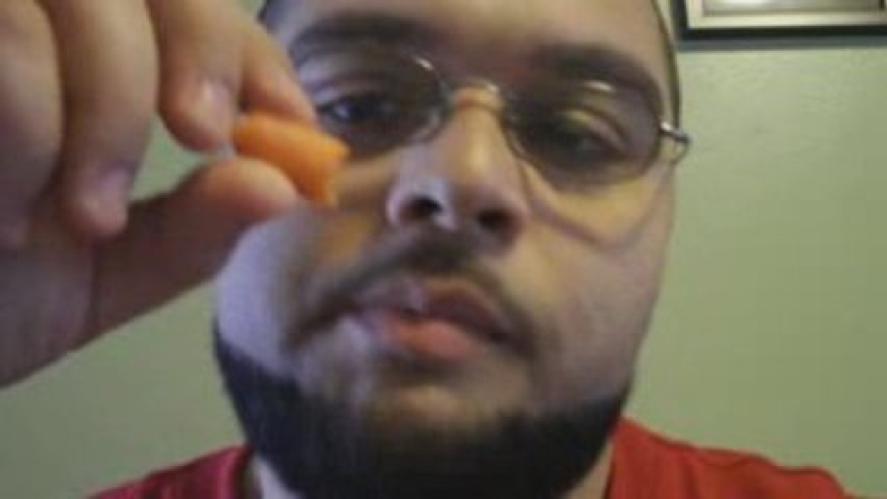 Fat Man Eating a Baby Carrot