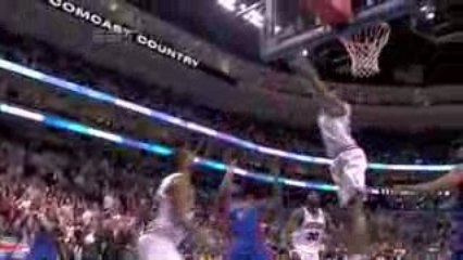 NBA Theo Ratliff uses two hands for this clutch block on Rod