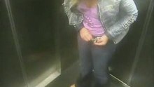 Woman uses elevator as bathroom