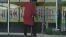 Dumb woman cleans automatic doors